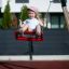 Mladá dívka si užívá Double Safety Seat double swing.