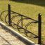 Bike Stand - černý kovový stojan na kola se čtyřmi kruhovými držáky.