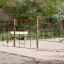 Lezecká konstrukce s Ural climbing net na pískovém hřišti.