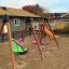 Double Seat swing na hřišti s pískovým povrchem