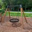 Bird Nest Single Swing (BNS 120 cm) v prostředí venkovního hřiště.