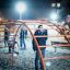 Cross Climber steel structure na hřišti v noci s hrajícími si dětmi
