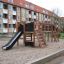 Venkovní dřevěné hřiště se skluzavkou a lezeckými prvky, Romping Center Nature.