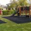 Square Play Nature dřevěné herní vybavení se skluzavkou a lezeckými prvky v zahradě