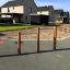 Venkovní dřevěná balanční a lezecká konstrukce Triple Somersault Nature v moderním obytném hřiš
