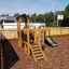 Fortress Nature playhouse with slide na hřišti.