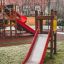 Toddler Tower Slide, červený herní prvek s kluzavkou a věží.
