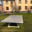 Concrete table tennis, free-standing v prostředí parku.