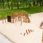 Panther wooden playhouse v parku na pískovém hřišti