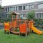 Rubik playhouse with slide na hřišti.