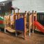 Rubik playhouse with slide na hřišti.