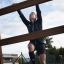Osoba leze na Step And Climb wooden ladder