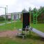 Outdoorové fitness vybavení New Age Fit MEDIUM v prostředí parku.