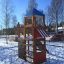 Logo Tower with Firepole playhouse with slide na zasněženém hřišti