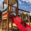 Logo Tower with Climbing Net playhouse with slide na hřišti
