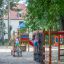 Děti si hrají na Bird Nest Swing with Tower (BNS 90 cm) playhouse with slide na hřišti.